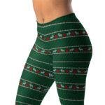 Žalios temprės su šventiniu linijiniu raštu moterims. Patogios, tamprios ir išskirtinės — puikiai tinka aktyviam laisvalaikiui, šventėms bei sportui.