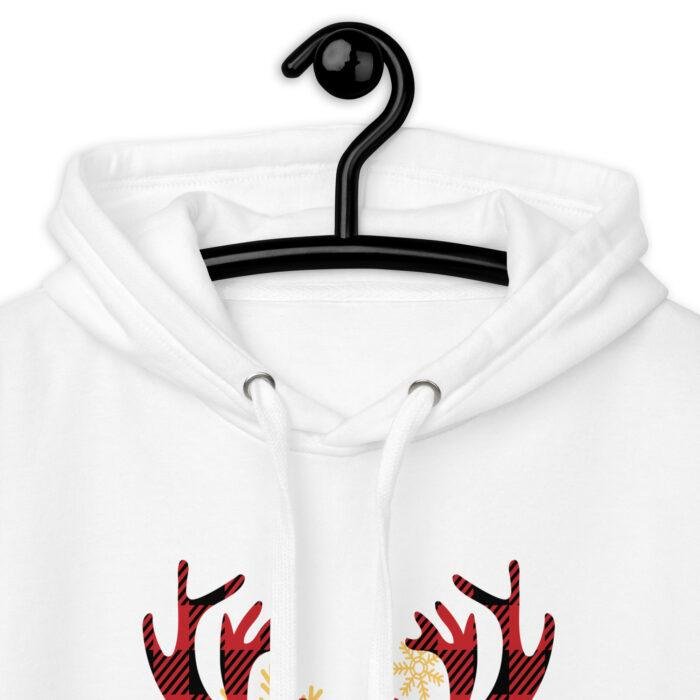 Kalėdinis džemperis su gobtuvu apkabins jus šiluma. Patogus, minkštas ir papuoštas subtilia šventine nuotaika – puikus pasirinkimas žiemos sezonui.